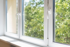 closed pvc window in room at apartment