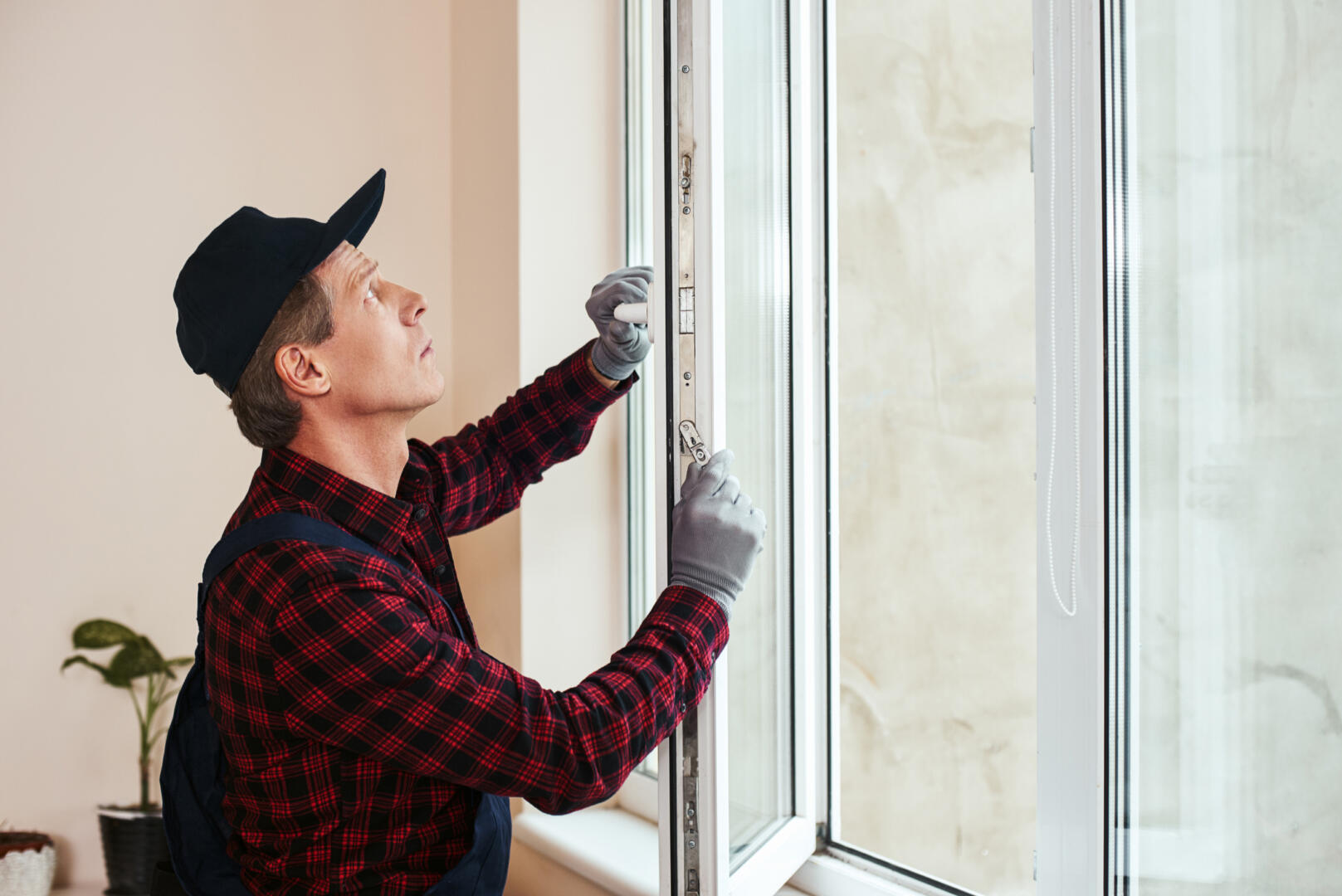 You will hear sound of quiet. Senior handyman setting new windows