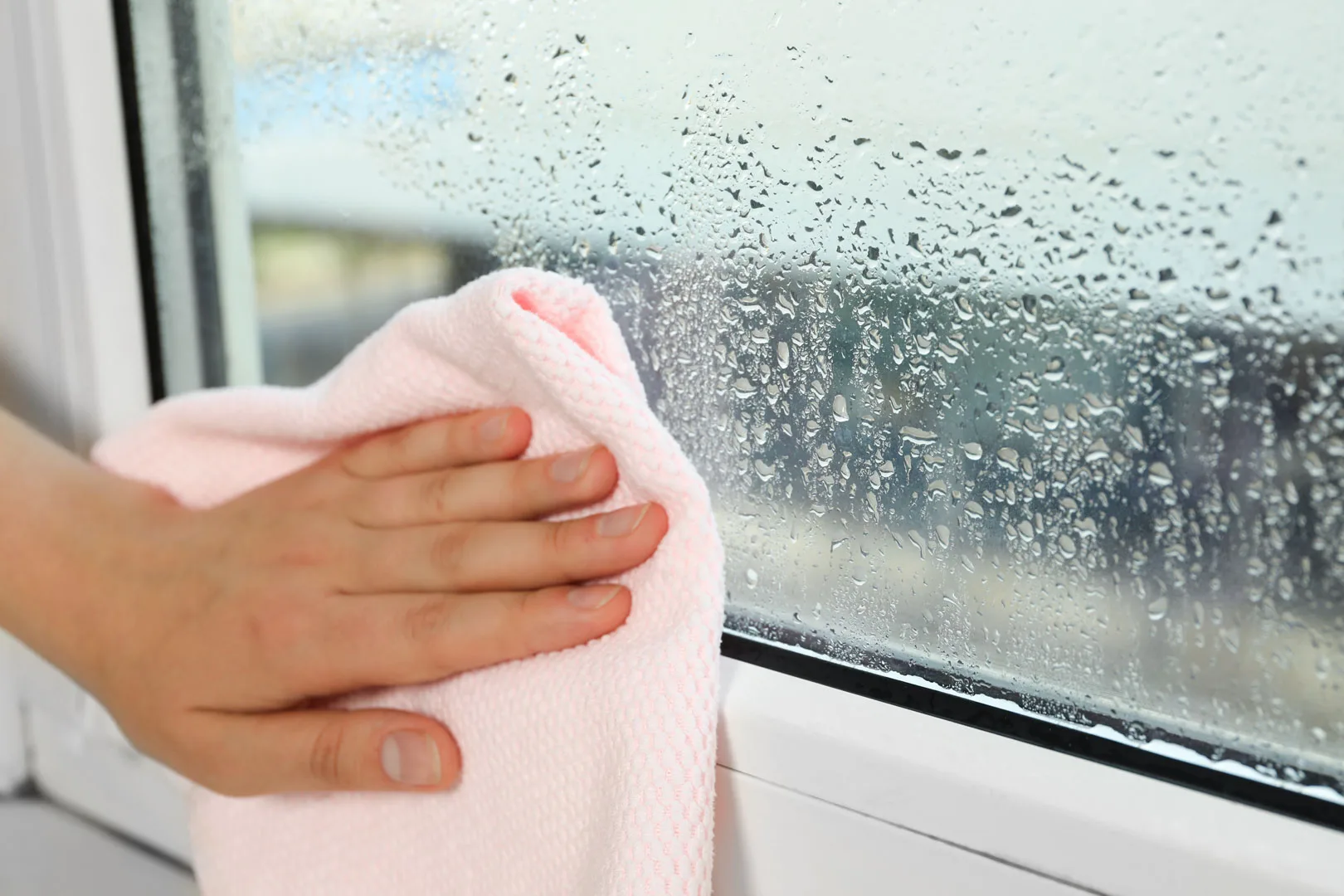 Rainstorm on the large windows of a patio door.