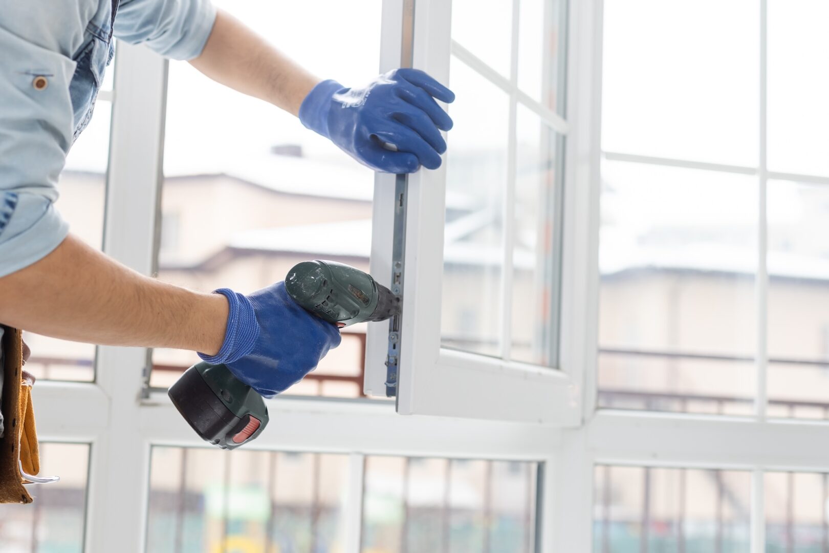 Handyman,Adjusting,White,Pvc,Plastic,Window,Indoors.,Worker,Using,Screwdriver